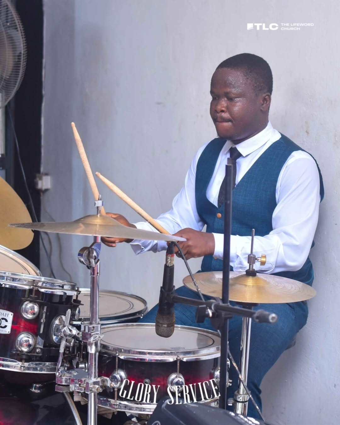 A drummer serving during a church gathering